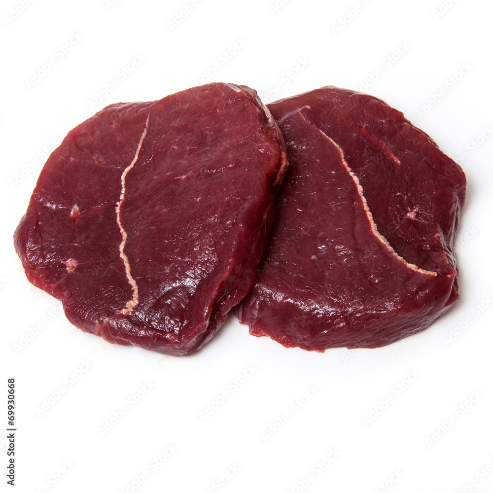 Zebra steaks isolated on a white studio background, Zebra steaks isolated on a white studio background,