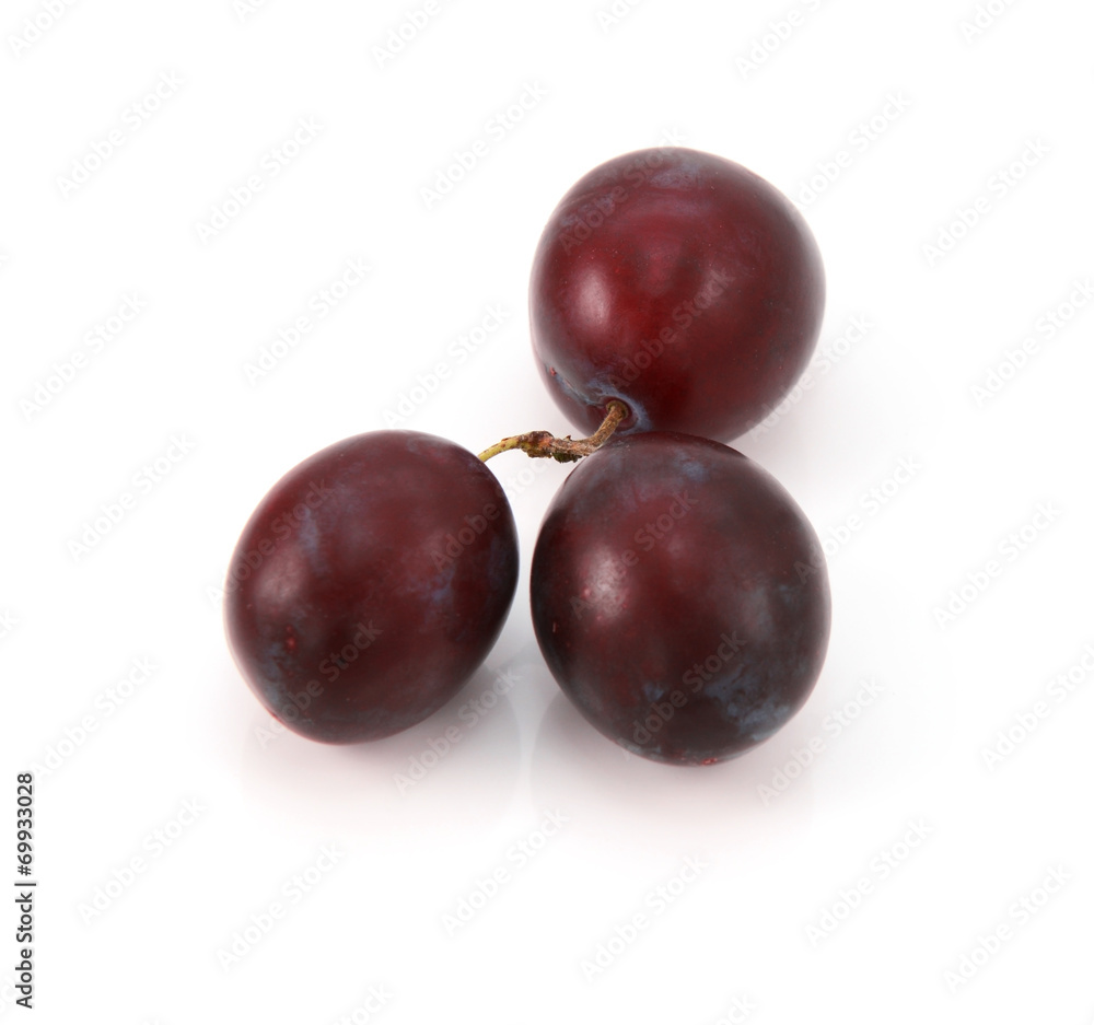 Three ripe plums