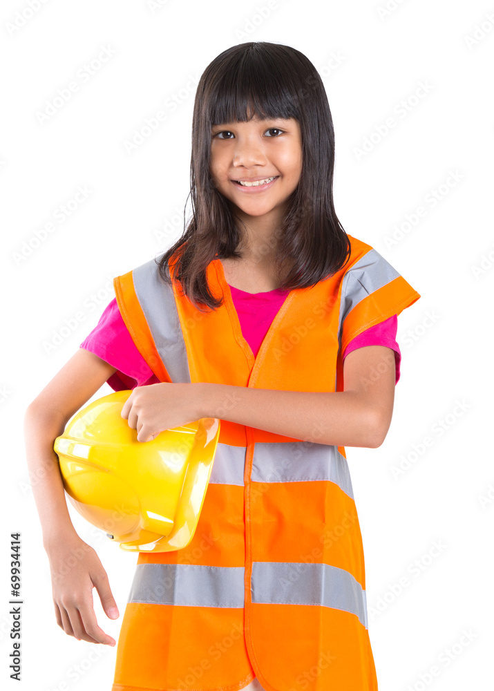 Young preteen Asian girl with hard hat and reflective vest Young preteen Asian girl with hard hat and reflective vest