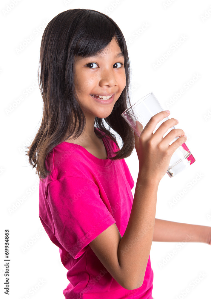 Young Asian preteen with a glass of water over white background Young Asian preteen with a glass of water over white background