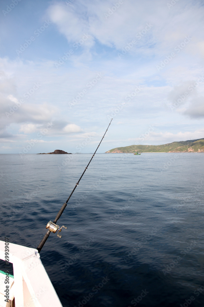 Fishing rod on a boat. Fishing rod on a boat.