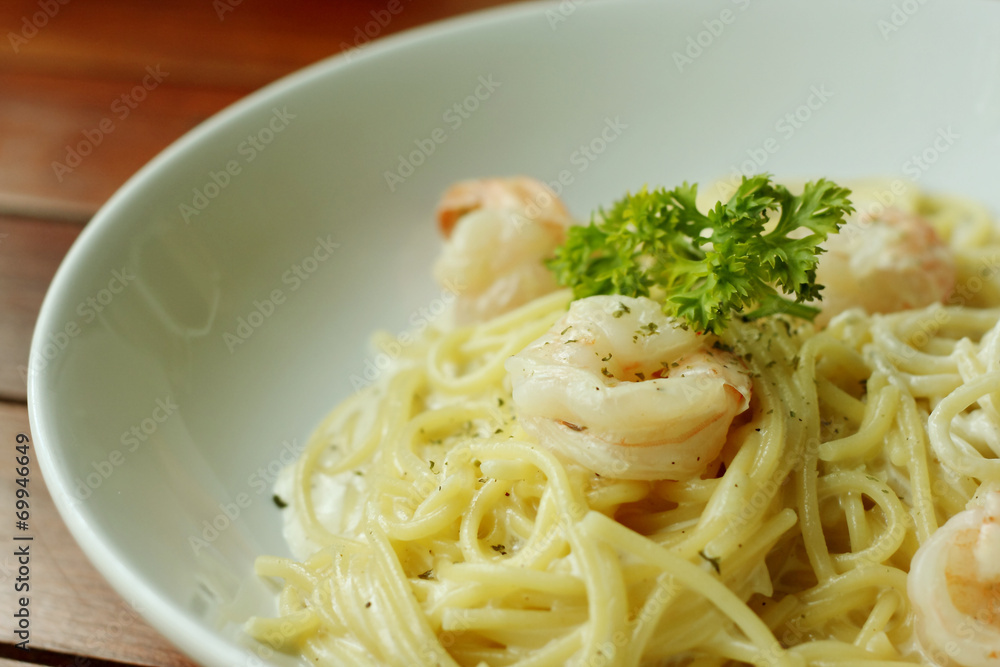 spaghetti with shrimp and white cream sauce. spaghetti with shrimp and white cream sauce.