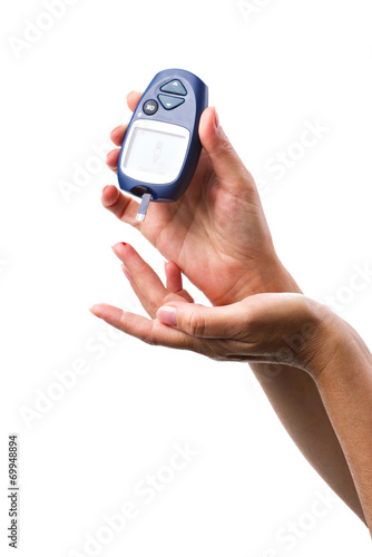 glucometer in woman's hand