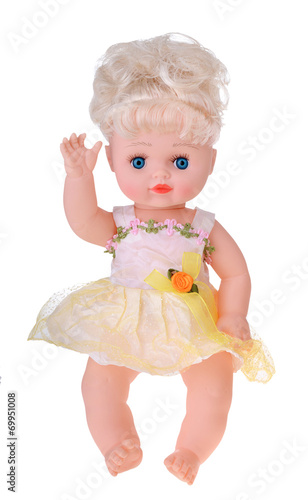 Girl doll sitting in colorful dress