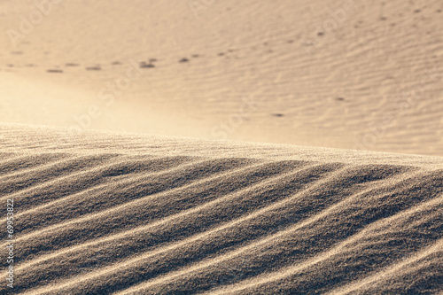 Dunes patterns and footsteps.Death Valley,California photo