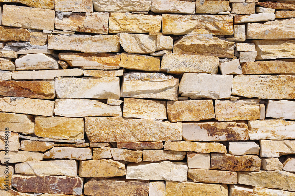 Obraz premium Colorful stone wall closeup