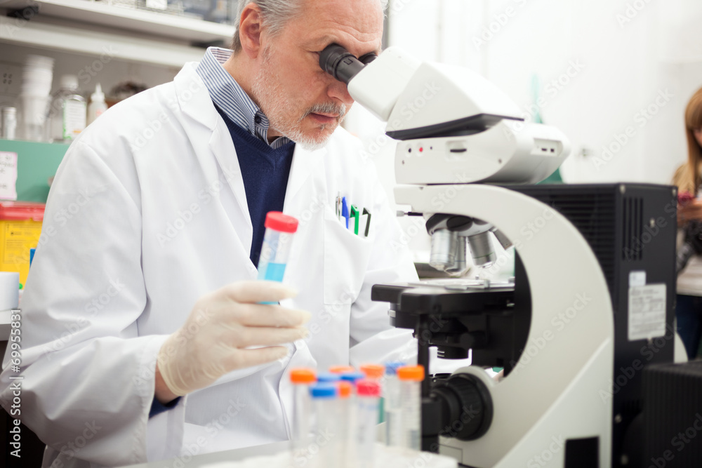 Scientist working in a laboratory Scientist working in a laboratory