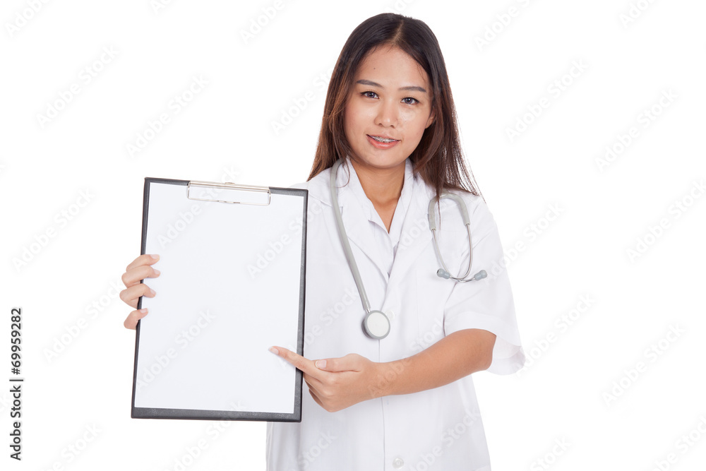 Young Asian female doctor point to a blank clipboard