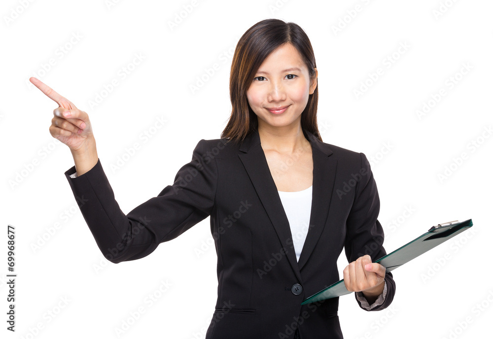 Businesswoman with clipboard and finger point up Businesswoman with clipboard and finger point up