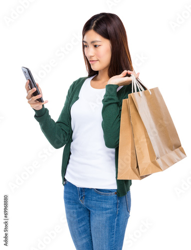 Woman shopping bag with mobile phone