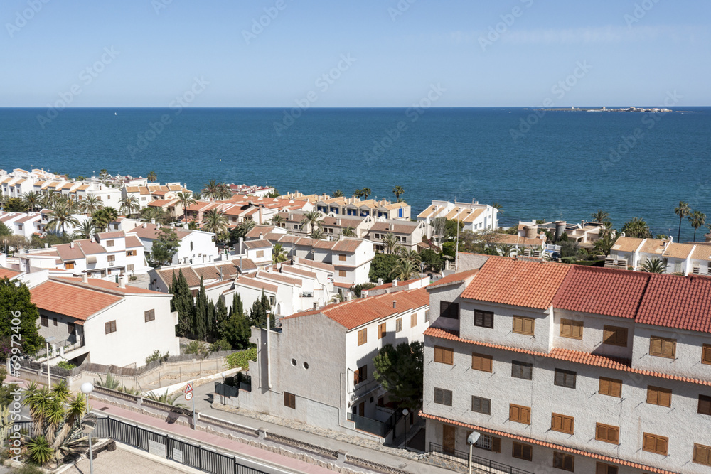 Views of Santa Pola town with Tabarca islet at the background