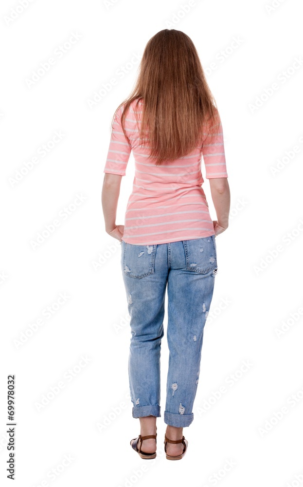 back view of standing young beautiful redhead woman. back view of standing young beautiful redhead woman.