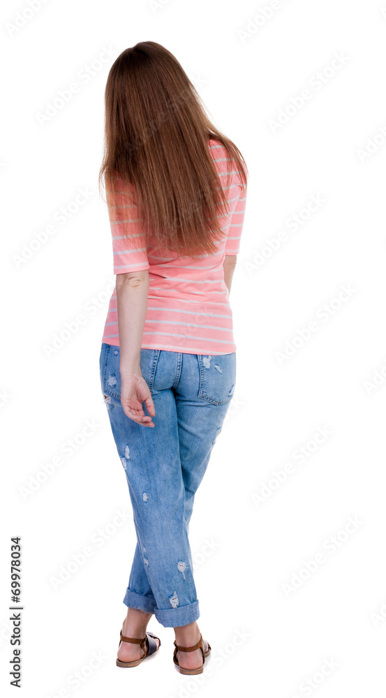 back view of standing young beautiful redhead woman. back view of standing young beautiful redhead woman.