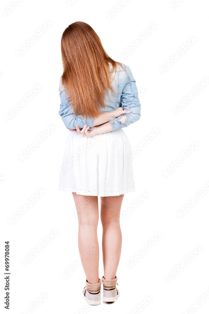 back view of standing young beautiful woman. back view of standing young beautiful woman.