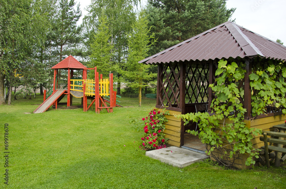wooden children playground in summer park wooden children playground in summer park