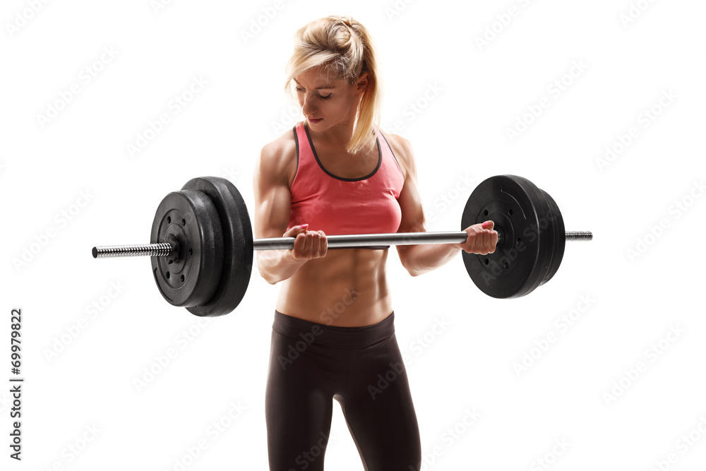 Strong muscular woman exercising with a barbell Strong muscular woman exercising with a barbell