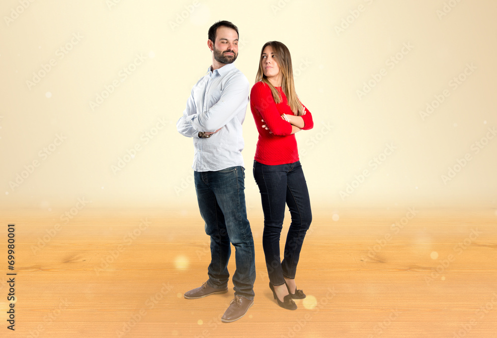 Fototapeta premium Couple over ocher background.