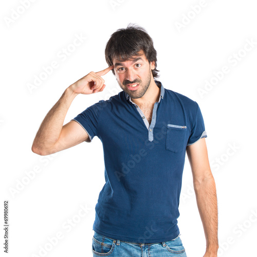 Man making crazy gesture over white background