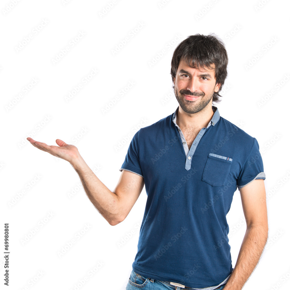 Man holding something over white background Man holding something over white background
