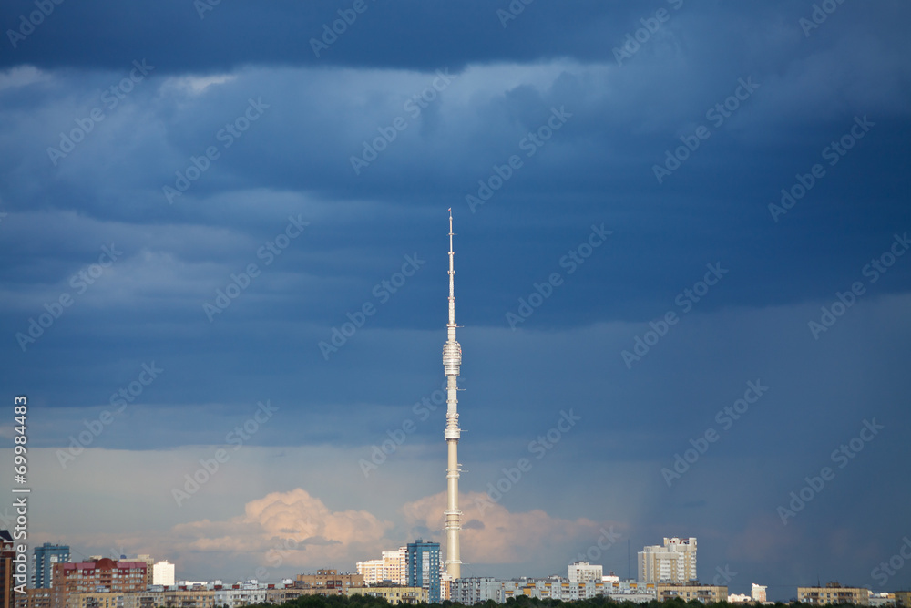 dark blue rainy clouds over TV tower