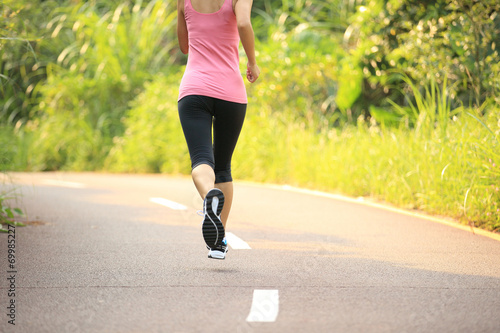 fitness woman runner running on trail © lzf