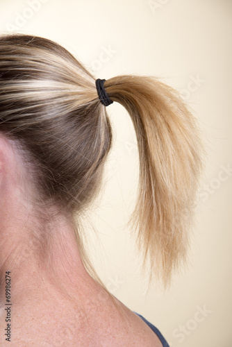 Woman with ponytail hairstyle photo