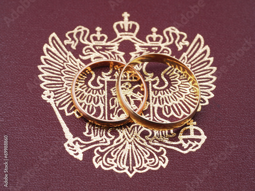 wedding rings and a Russian passport