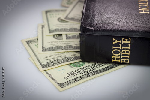 Holy Bible and money photo