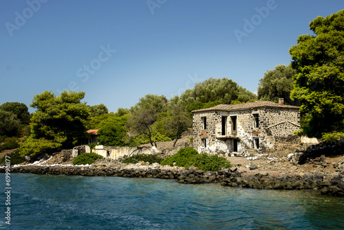 Old abandoned stone house on a greek small island