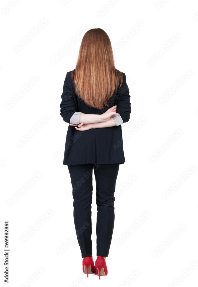 back view of redhead business woman contemplating. back view of redhead business woman contemplating.