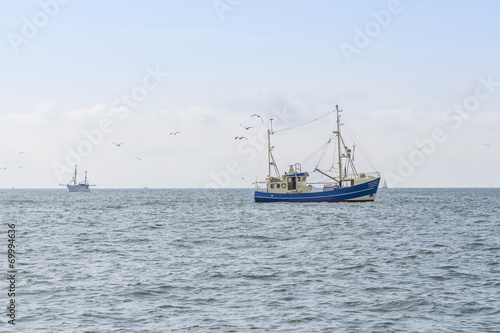 Fishing boats on a sea