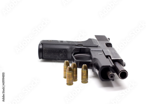 pistol with ammo on white background