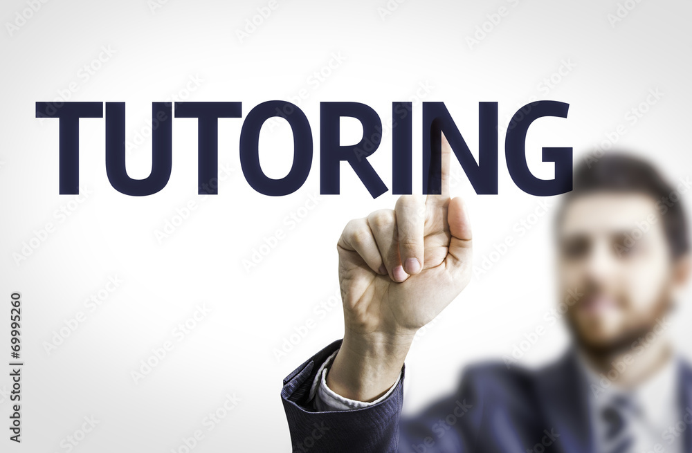 Business man pointing the text: Tutoring Business man pointing the text: Tutoring
