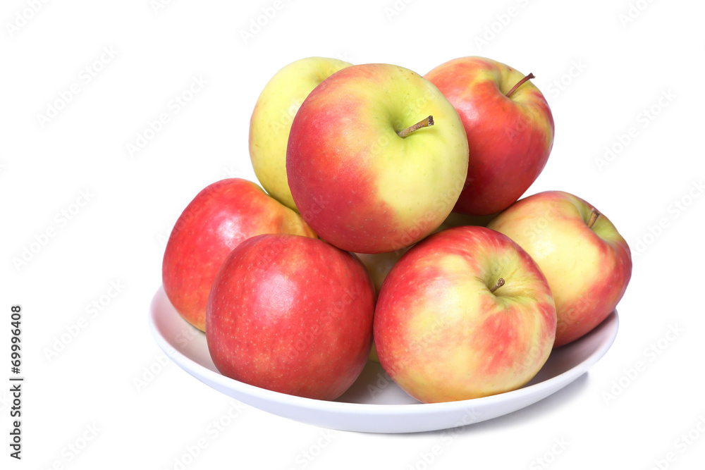 a dish full of fresh apples isolated on a white background a dish full of fresh apples isolated on a white background