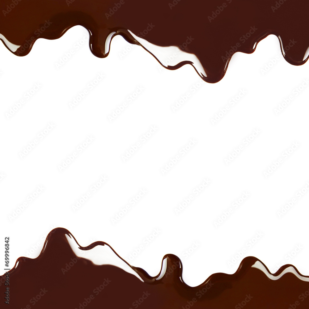 Melted chocolate dripping on white background Melted chocolate dripping on white background