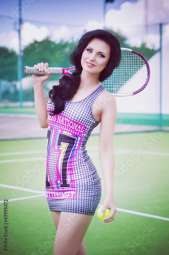 Beautiful woman playing tennis