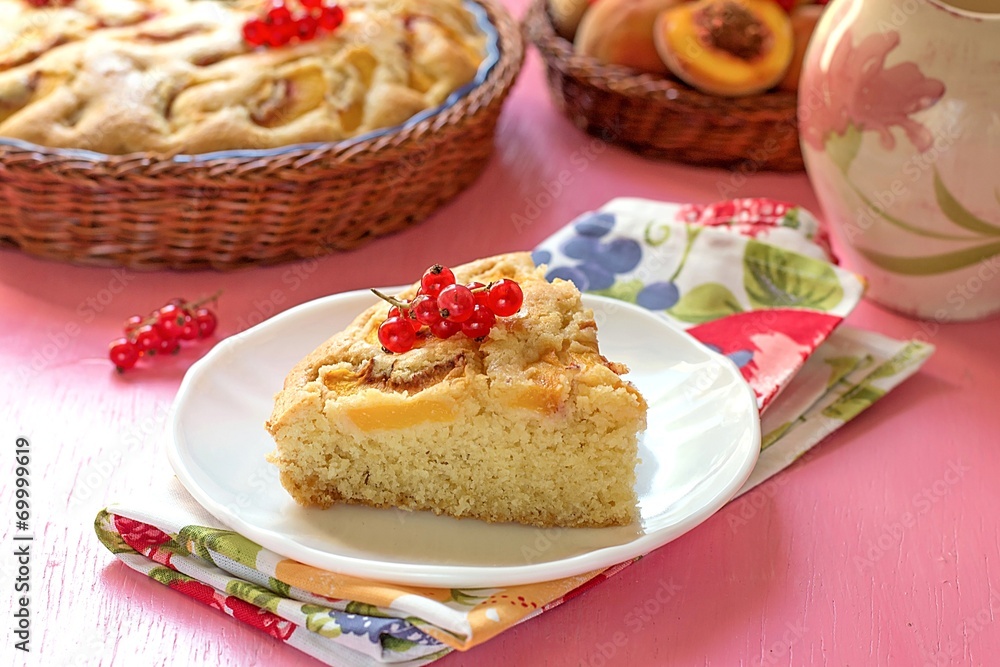 Piece of sweet peach cake with red currants Piece of sweet peach cake with red currants