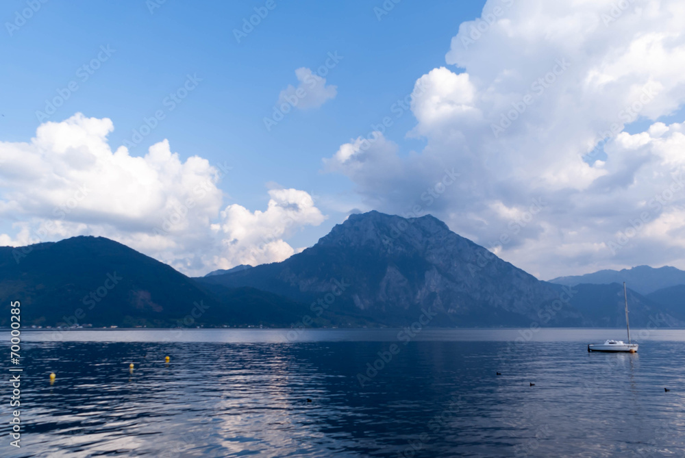 View of mountens and sailing boat