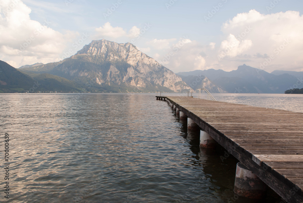 pier by mountains