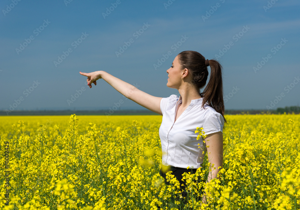 woman in yellow flower field woman in yellow flower field