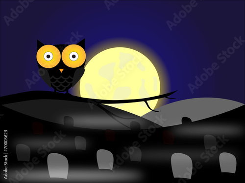 Halloween owl on cemetery