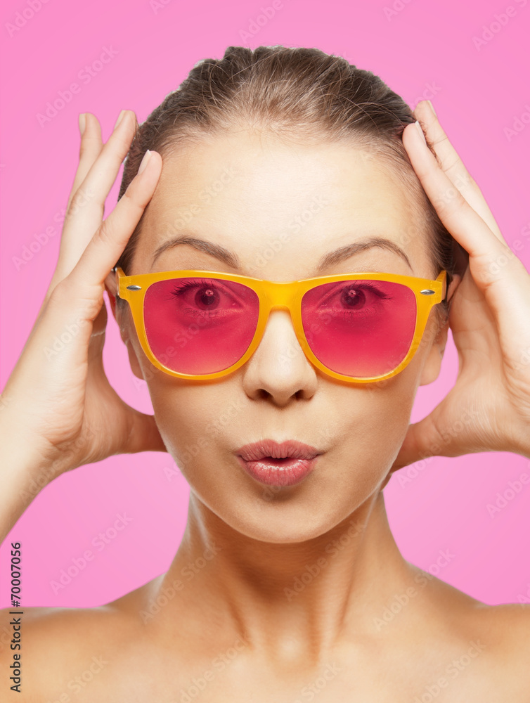 surprised teenage girl in pink sunglasses surprised teenage girl in pink sunglasses