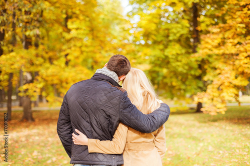 couple hugging in autumn park from back © Syda Productions