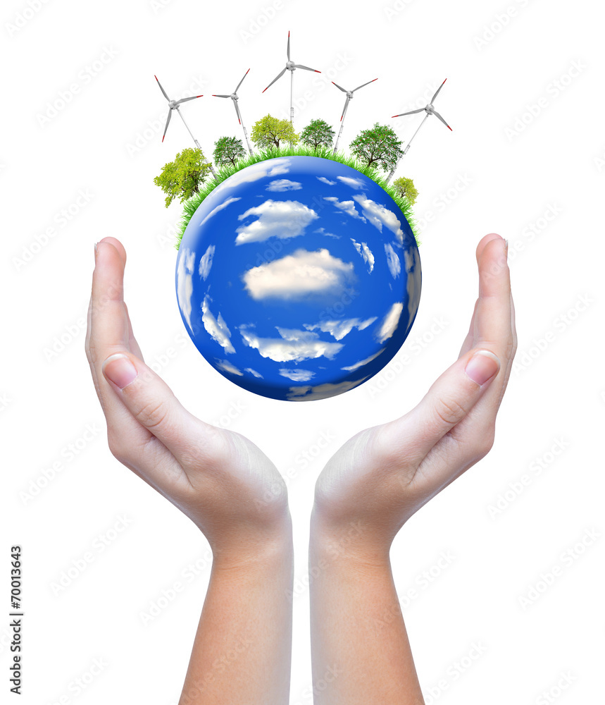 planet with wind turbines in hands planet with wind turbines in hands