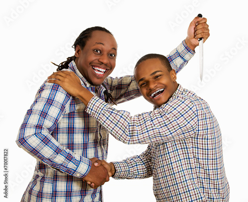 Фотография Two men fake friends, backstabbing concept on white background