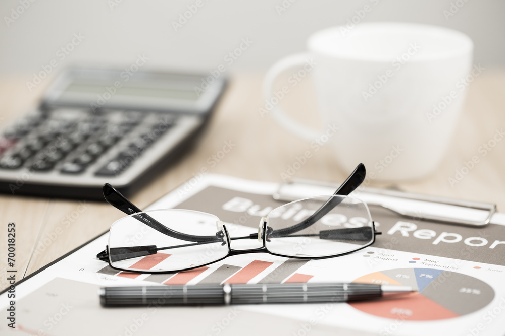 Business report. Cup of coffee and document. Business report. Cup of coffee and document.