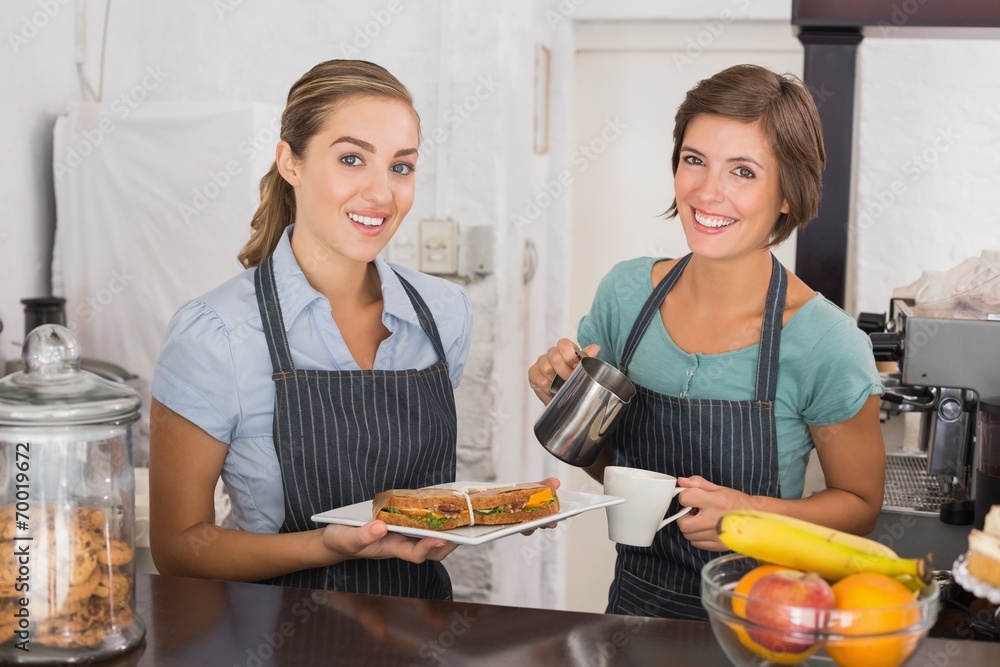 Pretty waitresses working with a smile Pretty waitresses working with a smile