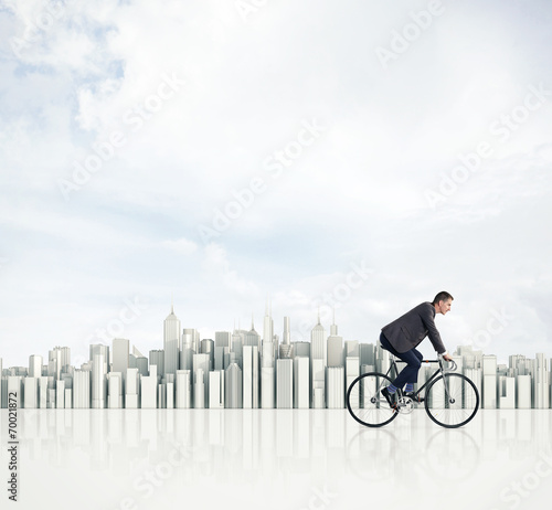 Business man on a bicycle © SFIO CRACHO