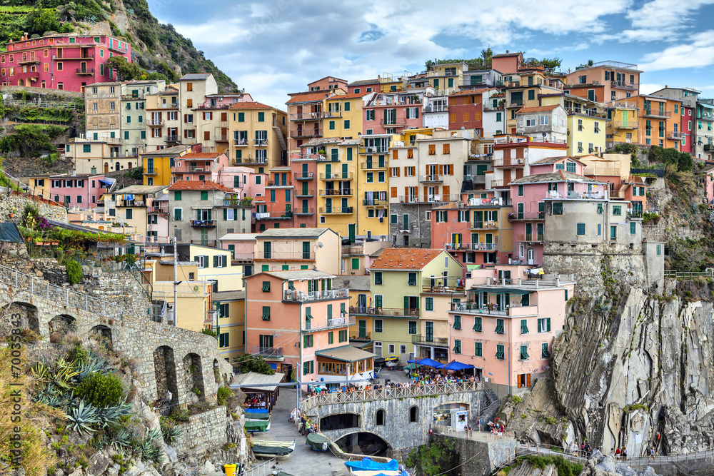 Houses on a cliff in Manarola, Italy