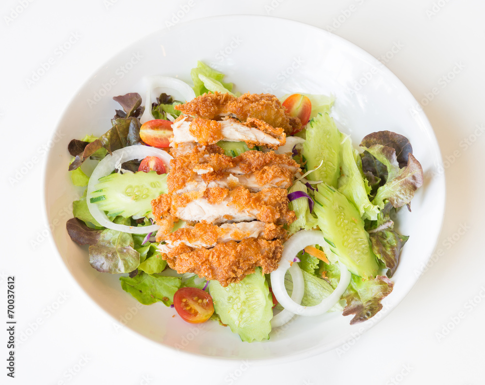 Fried Chicken salad with tomatoes, Cucumber and Onion. Fried Chicken salad with tomatoes, Cucumber and Onion.